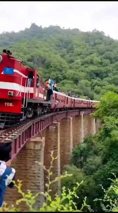 Filming a train crossing bridge while being on the bridge