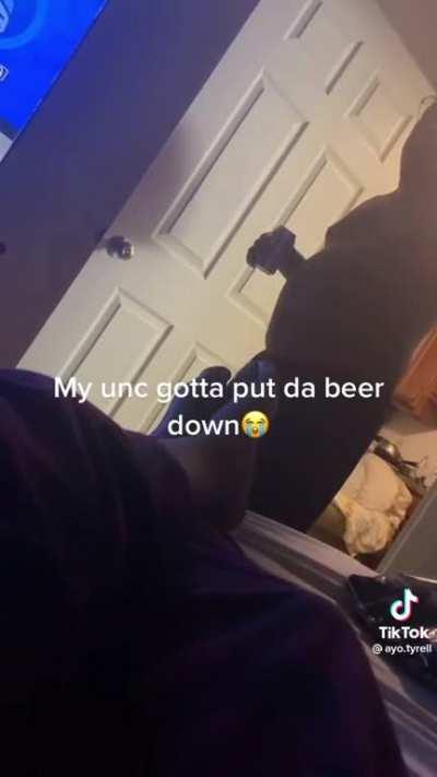 His unc gotta put da beer down 😭