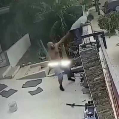 Guy tries to steal a kids bike in the Dominican Republic but gets caught by dad.