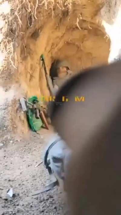 AFU soldiers in trenches under russian artillery working on their positions. Date/place unknown.