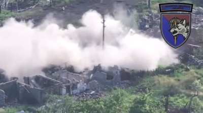 A Ukrainian infantryman destroys a building with Russian occupants using a pair of TM-62 mines. Lysivka village, Donetsk region
