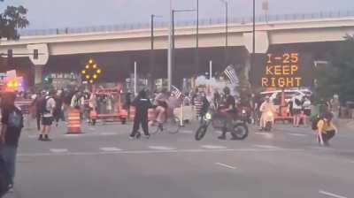 Colorado: Unlawful assembly declared at anti-ICE protest in Denver, tear gas used.