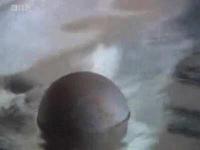 Cannon ball being tossed into pure elemental mercury.