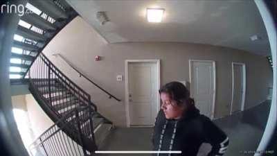 Neighbor realizes the doorbell camera will see her steal the package