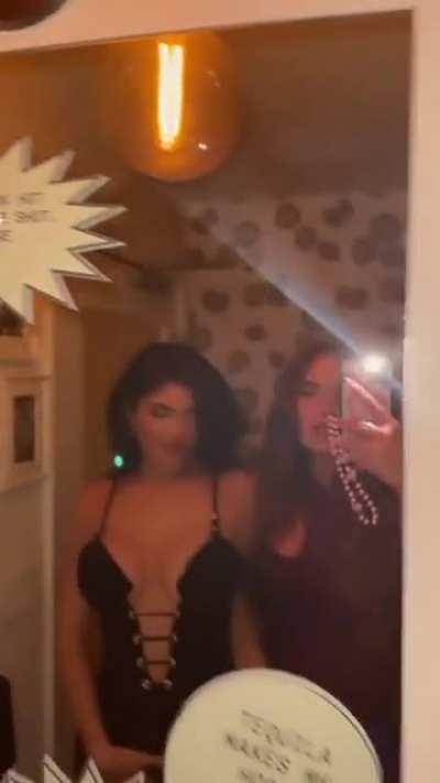 Kylie groping her boobs