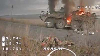 Ukrainian FPV kamikaze drone hits a Russian soldier after their BTR got destroyed in Guyevo, Kursk Oblast. April 2025