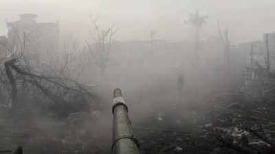 POV of Russian tank in city fighting.