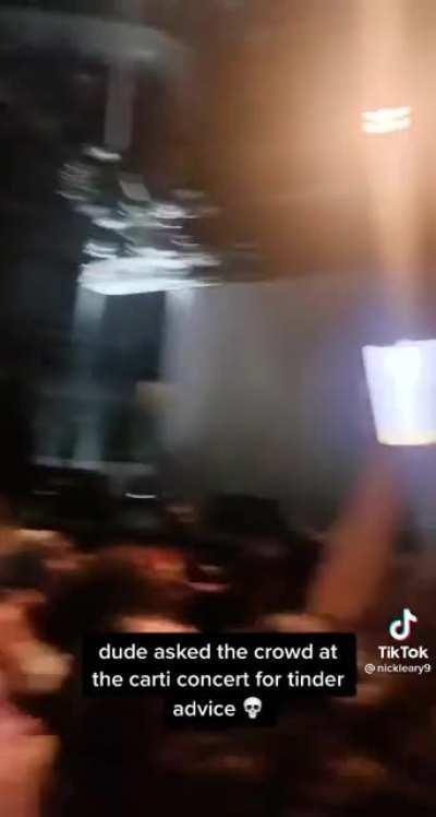 Concert crowd plays a game of tinder