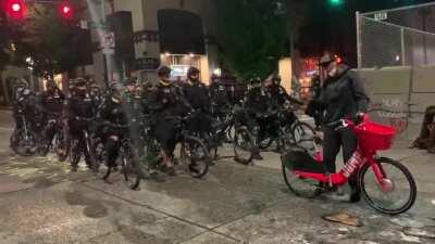 Some levity in Seattle last night as a protester messed with SPD's bike division