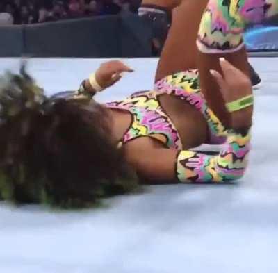 Naomi getting cocky about to humiliate Alexa, only to be knocked out, pinned with her leg bent behind her head.