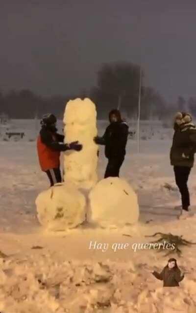 Having fun in the snow with a snowp**is