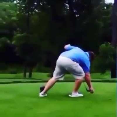 Trying to play golf hammered