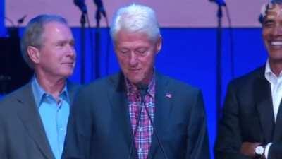 Bush cracks joke to Obama while Clinton makes a speech