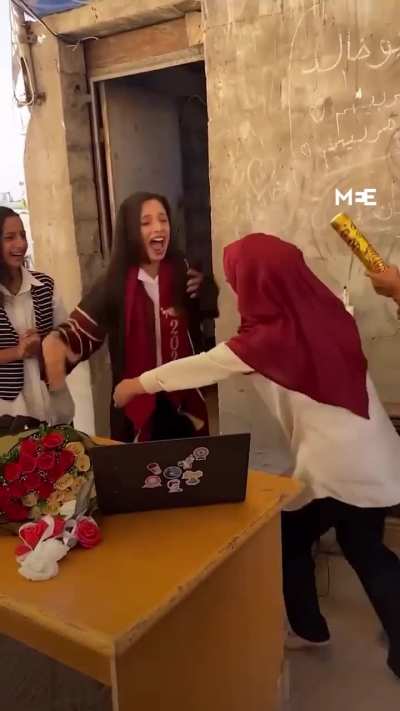 A student in Gaza was filmed celebrating her achievement in her high school final exams.