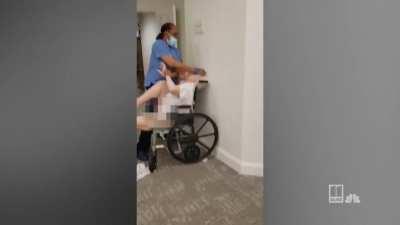 Nurse abusing an elderly resident of a care home