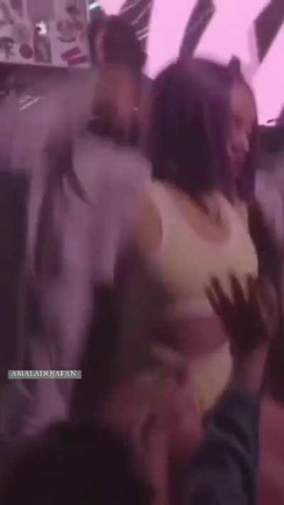 doja bouncing at a show.