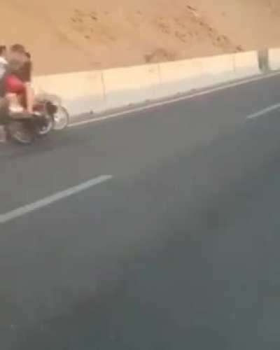 Doing wheelies in a highway