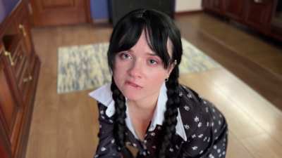 My ASMR is dressed up as Wednesday Addams