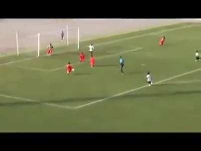 People of short stature playing a football match in Ghana.