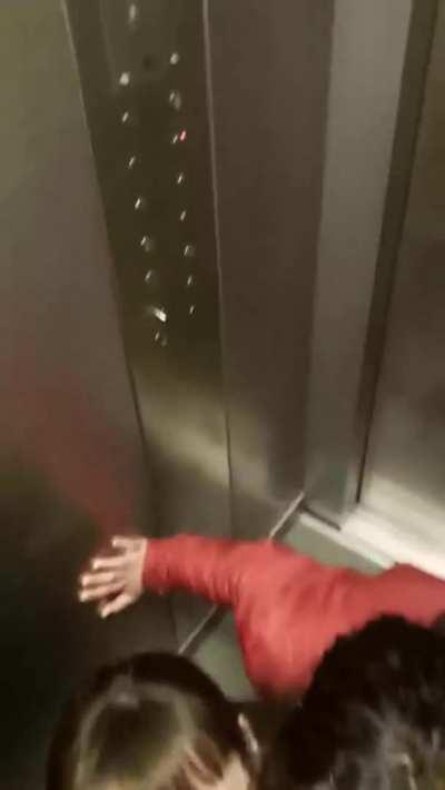 Three in an elevator