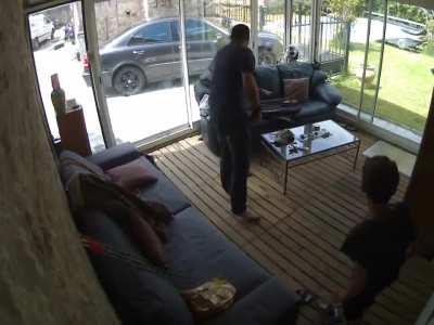 Shooting an arrow from inside the house.