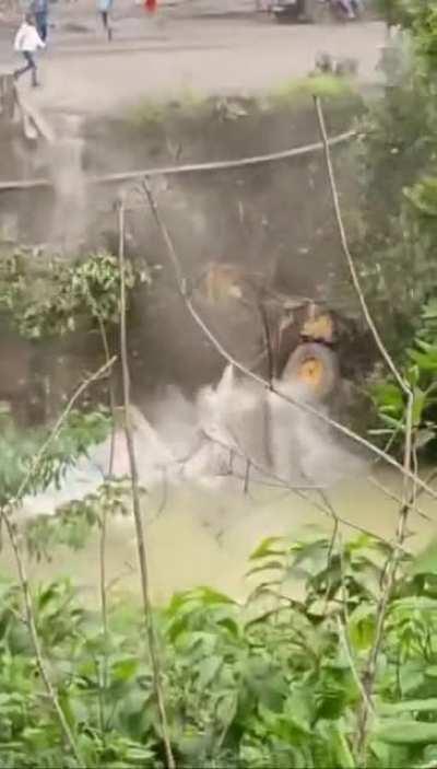 3rd Aug 2022, A towing crane falls into the canal after a harness breaks. West Bengal, India