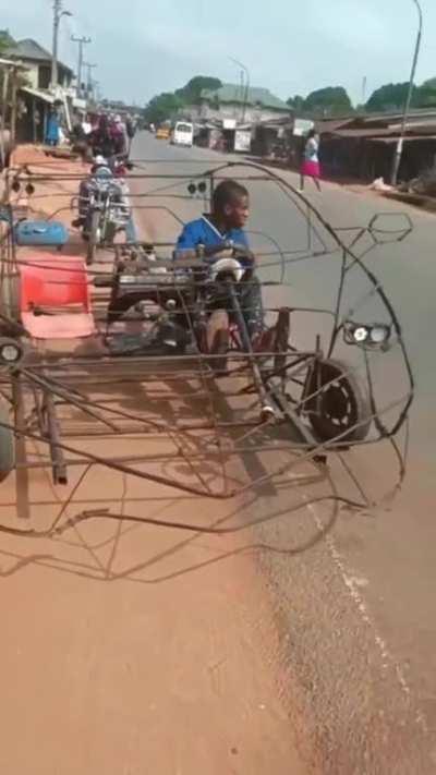 Man in Africa creates a fully functioning car with only metal rods and a small engine