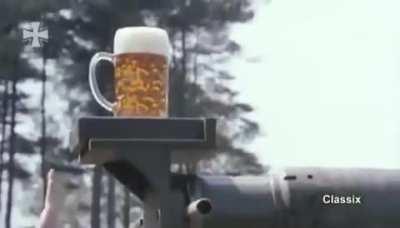 Using a mug of beer to test the gun stabilization on a German Leopard 2 tank