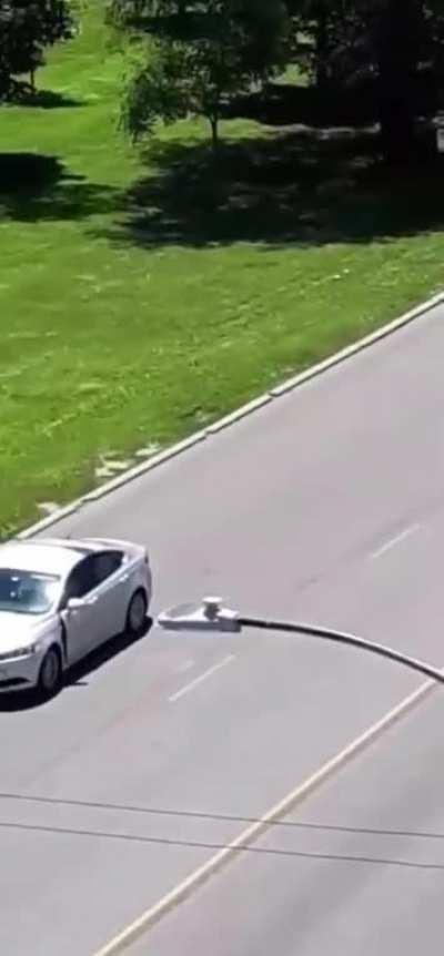 Dude throws rocks at a car, and gets to regrets it.