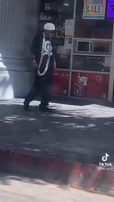 Unc walking around w that long ah rope around his neck