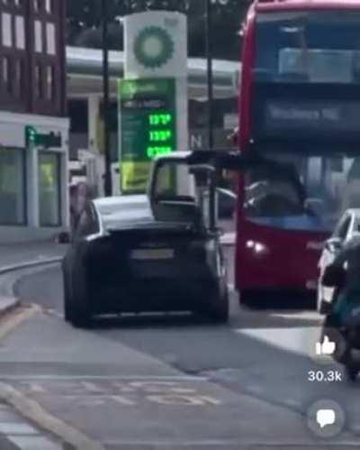 The results of driving with your Tesla door up.