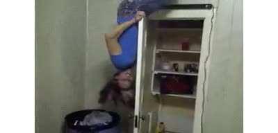 WCGW laying on a door like this