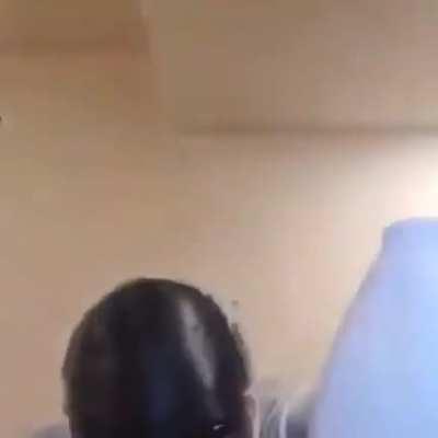 Pouring bleach on his face