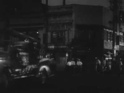 Godzilla (1954) - Godzilla burns down buildings