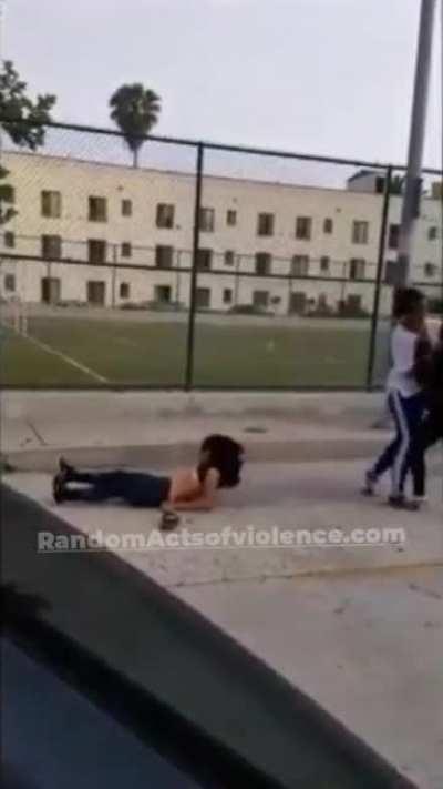 GIRL GETS KNOCKED OUT WITH HEAD STOMP & SHIRT PULLED OFF