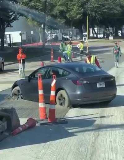 To pop a u turn in a Tesla 