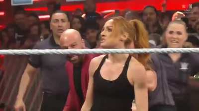 Becky Lynch laying out AJ Lee