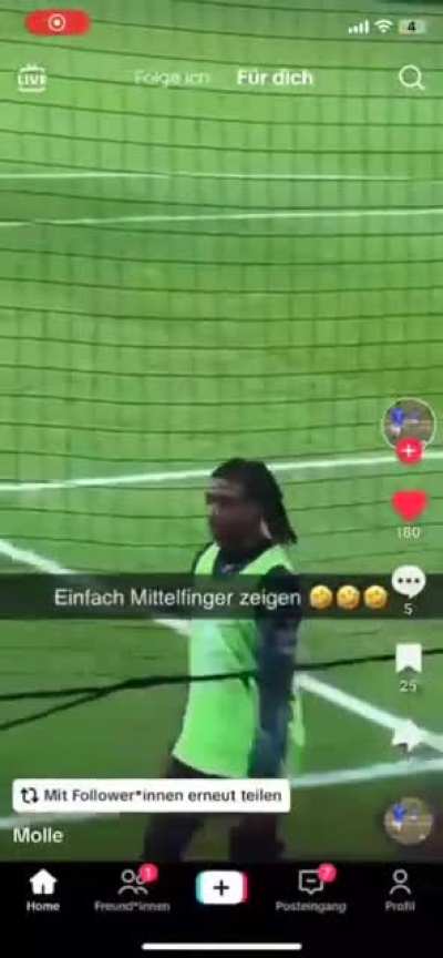 Michael Olise showing the middle finger to Mainz fans