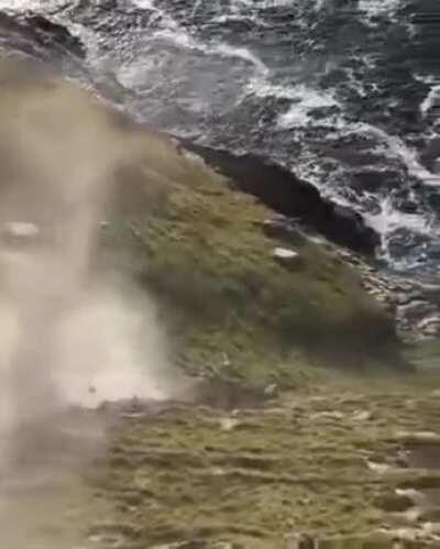 Pushing a big rock down