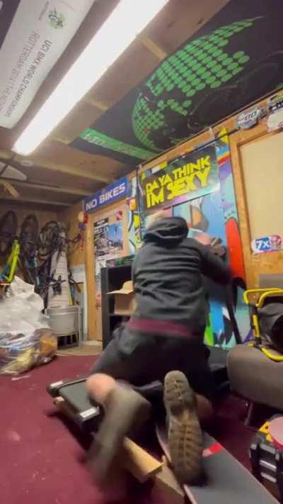 Trying to do a skateboard trick on a treadmill