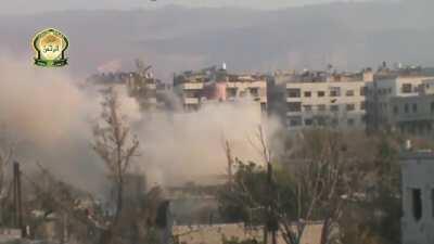 Al-Rahman improvised cannon lobs a shell through the barricaded window of an SAA occupied building - Jobar, Damascus - 8/2/2015