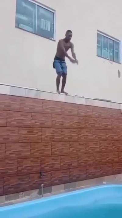 Dude tries to do a flip into the pool