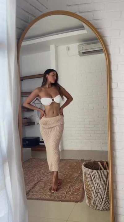 Dressing For Dinner On The Beach