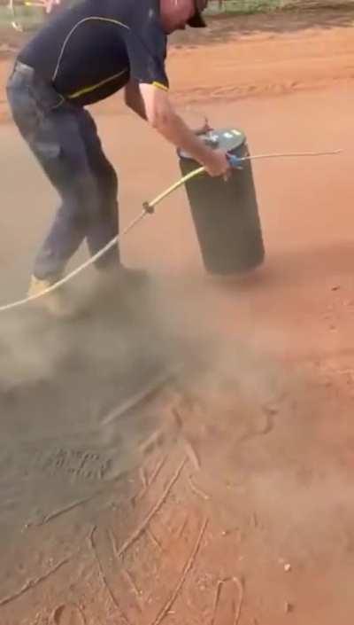 Cleaning the filter of this agricultural machine