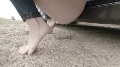 Just a car door between her and the world