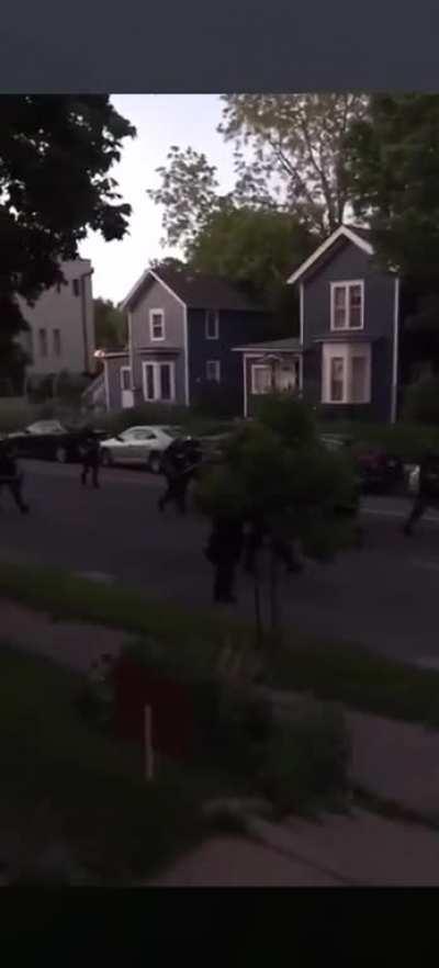 Cops shoot at local politician for filming them from her porch.