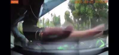 Rear-facing camera catches 3 friends out for a ride on motorcycles. One fails to pay attention to traffic and slams into the first one. The idiot acts like nothing happened.....