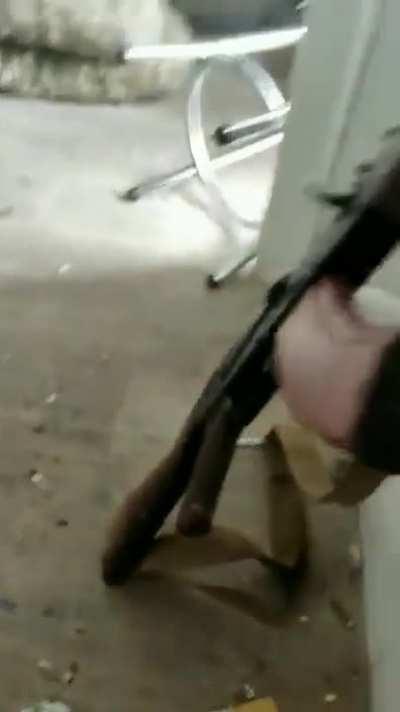 Ukrainian aerial reconnaissance team of the 93rd Motorized Brigade in Bakhmut during shelling. The drone operator tries to keep the remote as close to the window not to lose the connection with his drone