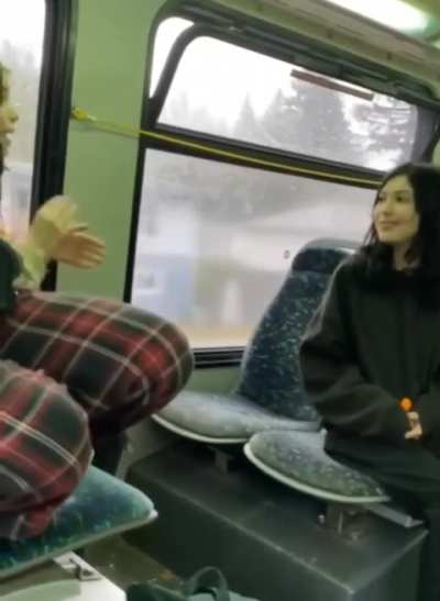 Young girl kicks woman on back of bus after being told not to vape