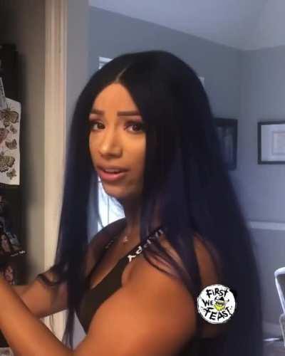 Sasha showing off her fridge